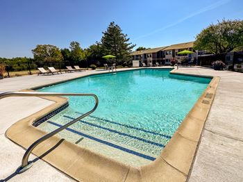 Heated pool and sundeck at three oaks apartments in troy, mi.